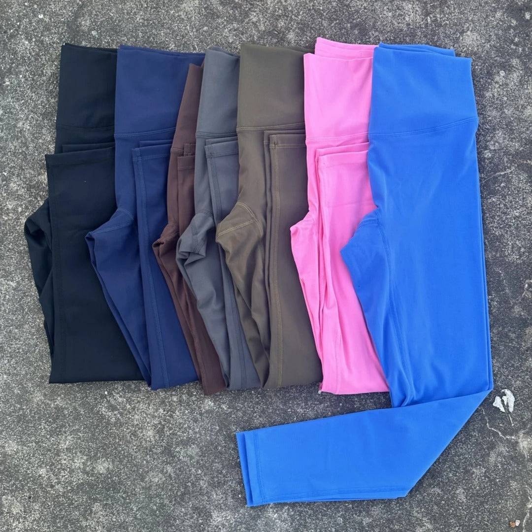 High-quality solid color high-waisted yoga leggings for women, sports pants, butter-colored athletic gym training, comprehensive jogger, squat-proof.